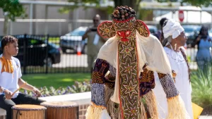 A dancer at the Africatown Heritage House dedication