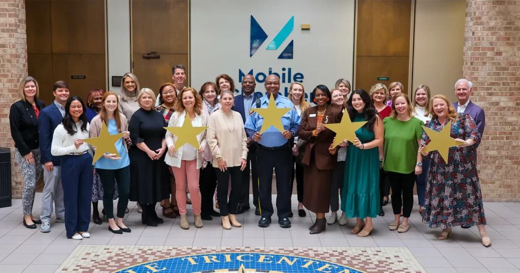 Mobile Chamber staff celebrating 5-star accreditation